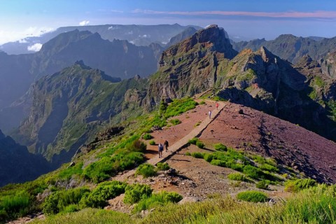 View from Pico do Arieiro (1818m) hiker, hiking trail, mountains, gorse, Madeira Island