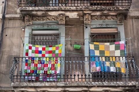 Colourful laundry on a washing line in the Barcelonata district of Barcelona, Spain, Europe