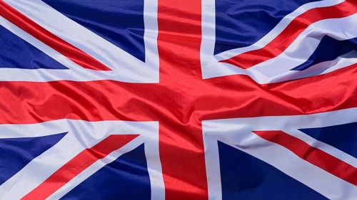 Close-up of a waving flag, national flag of Great Britain, fabric looks like silk