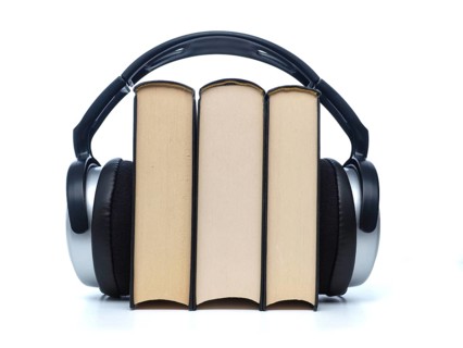 Three books with headphones, audiobooks concept on white