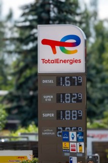 Digital display panel with prices for petrol and diesel at a TotalEnergies petrol station,