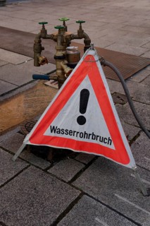 Burst water pipe, damage, pipe, warning sign, notice, sign, attention, danger, water damage,