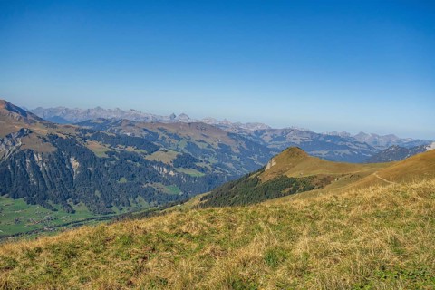 Landscape photograph of mountains and valleys in the Alps on a clear, sunny day, saas fee,