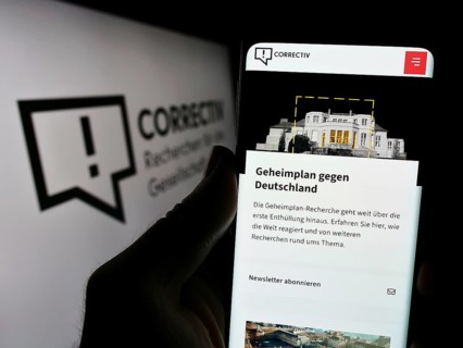 Stuttgart, Germany, 03-05-2024: Person holding smartphone with webpage of Correctiv, Recherchen für