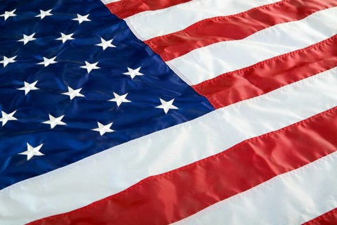 Crumpled, vintage American flag. Real photo. Closeup