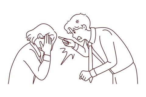 Furious businessman scolding stressed female employee at workplace. Angry male boss lecture scream