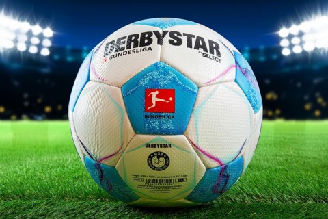 Symbolic image Football Bundesliga 2024/25: Close-up of the DERBYSTAR match ball in a stadium