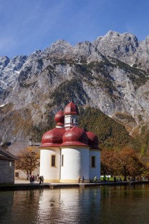 Pilgrimage church St. Bartholomä with Watzmann east face at Königssee in autumn, Schönau,