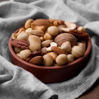 High view delicious snack nuts bowl