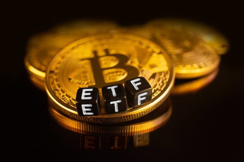 Bitcoin Exchange-traded fund ETF launch concept with coins and letters