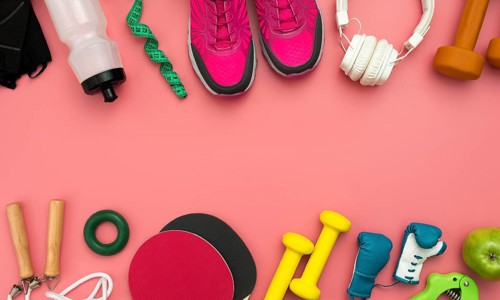 Flat lay sneakers with gym essentials
