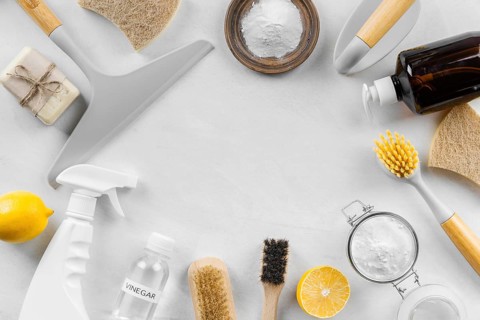 Flat lay eco cleaning products with lemon baking soda