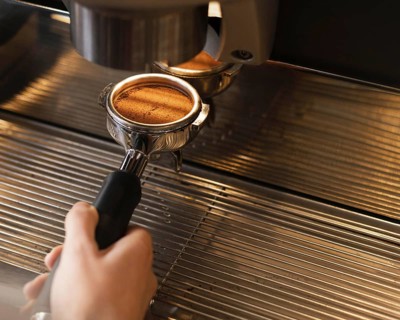 Close up hand preparing coffee with machine. Resolution and high quality beautiful photo