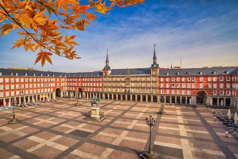 Madrid Spain, city skyline at Plaza Mayor with autumn leaf foliage