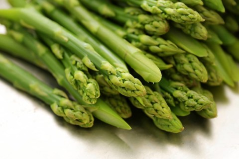 Green asparagus shots, blanched or cooked, healthy spring vegetable, selected focus, narrow depth