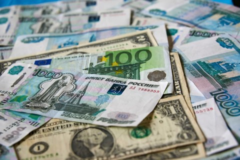 Background of paper bills dollars, euros and rubles