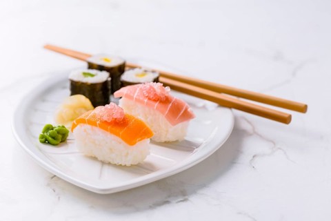 Assortment of vegan sushi with vegetables, seitan, Konjac plant, tofu as fish substitudes, with
