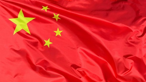 Close-up of a waving flag, national flag of China, fabric looks like silk