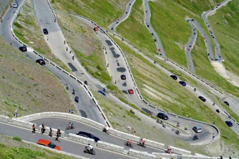 Stelvio Pass with hairpin turns, much traffic in the summer season, busy and crowded with