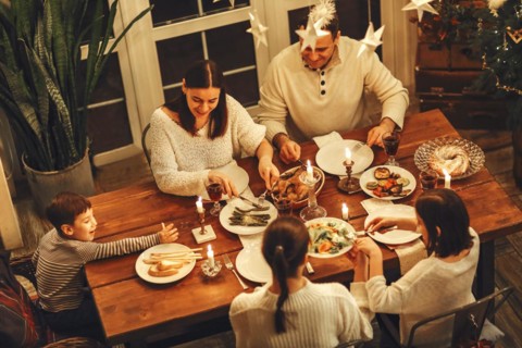 View from above of happy large family with many children celebrating Christmas or New Year eve