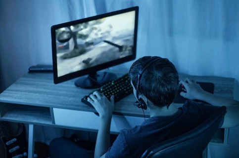 Young boy playing computer. Resolution and high quality beautiful photo