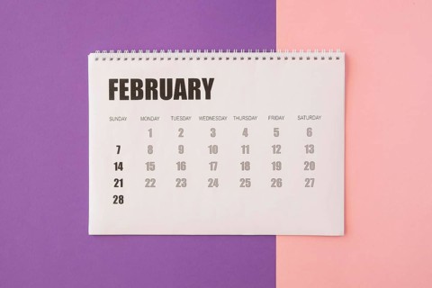 Top view desk february calendar