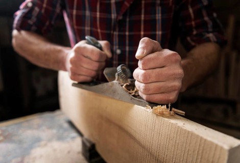 Man working with wood workshop