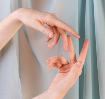 Young woman teaching sign language 2
