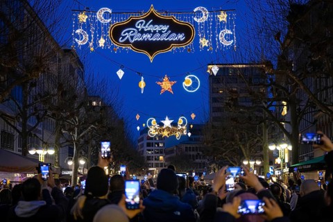 The illuminated lettering Happy Ramadan shines on the evening of 10 March 2024 as part of a light