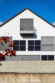 Solar panels on the wall of a detached house in Aachen, Germany, Europe