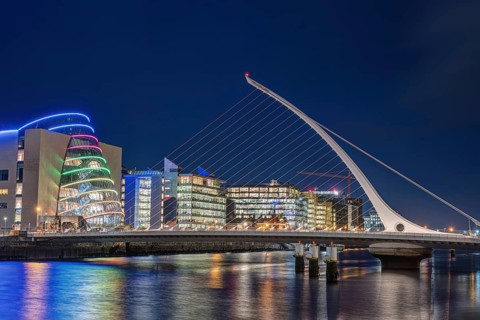 The harbour area with the Samuel Beckett Bridge in Dublin, Ireland, at night, Europe
