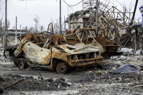 Burnt cars and destroyed buildings of the workshop of the Azovstal plant in Mariupol war in Ukraine