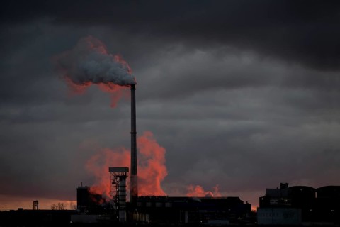 The Südzucker factory in Plattling at sunrise, water vapour coming out of the chimney, sugar