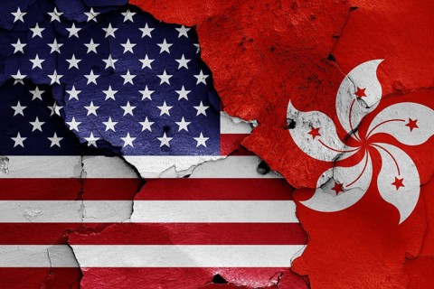 Flags of USA and Hong Kong painted on cracked wall