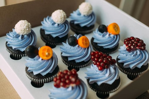 Box with yummy muffins