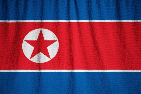 Closeup of Ruffled North Korea Flag, North Korea Flag Blowing in Wind