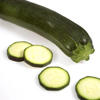 Long Courgette or Zucchini (cucurbita pepo) against White Background