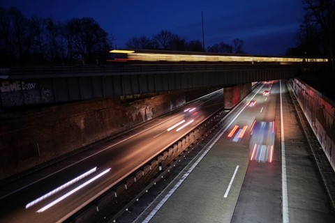 Germany, Berlin, 18. 02. 2021, motorway near Nikolassee, twilight, railway bridge, suburban train,