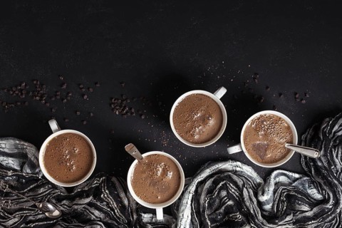 Hot chocolate mug with coffee beans