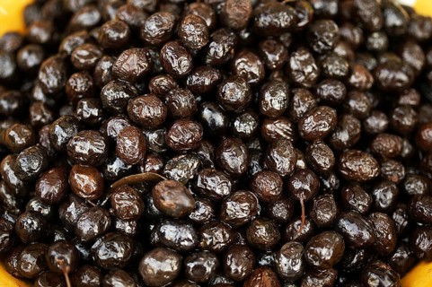 BLACK OLIVES olea europa on a market stall