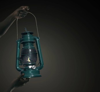 Man with a paraffin lamp
