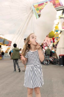 Girl enjoying cotton candy