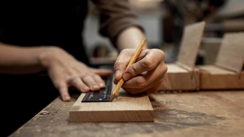 Female carpenter working studio with pencil. Resolution and high quality beautiful photo