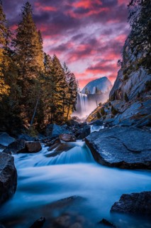 Vernal Falls waterfall of Yosemite National Park from the water that falls into the stones in