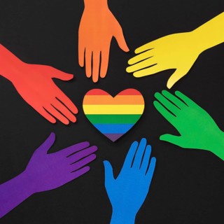 Diversity composition different colored paper hands with rainbow heart