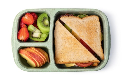 Lunch box with delicious food isolated on a white background