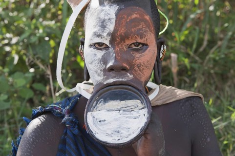 Surma woman with round lip plate, lip plate, Kibish, Omo Valley, Ethiopia, Africa