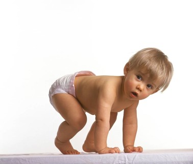 BABY GIRL AGAINST WHITE BACKGROUND
