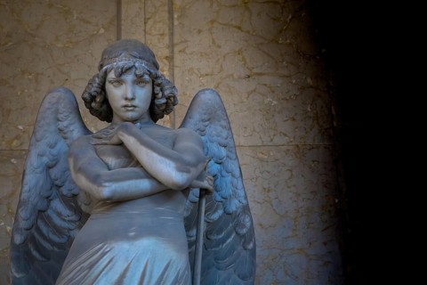 GENOA, ITALY - June 2020: antique statue of angel (beginning 1900) (marble) in a Christian Catholic
