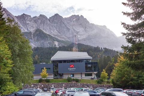 New cable car station to the Zugspitze with Zugspitze massif from the Eibsee lake, Grainau,